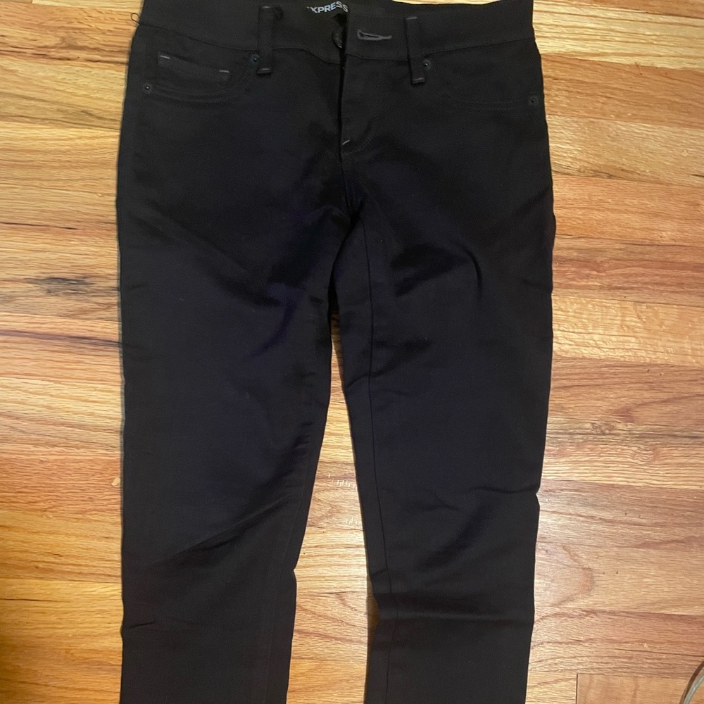 Express black cropped skinny jeans with side zip at ankle